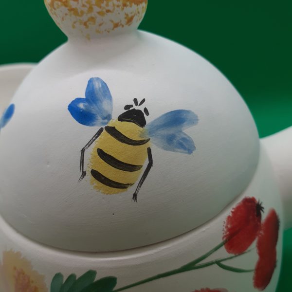 Bee on teapot