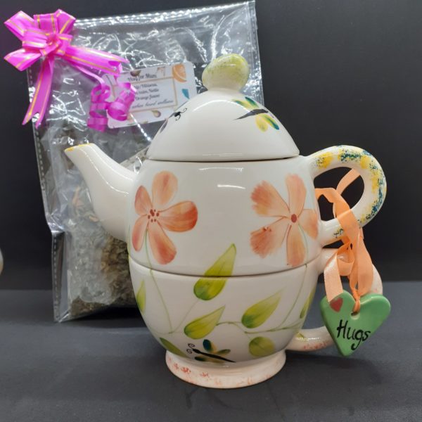 orange teapot and tea